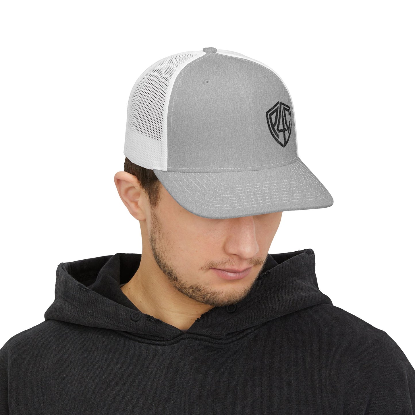 Embroidered Shield Snapback Trucker Hat — Classic Mesh Cap with Monogram Patch