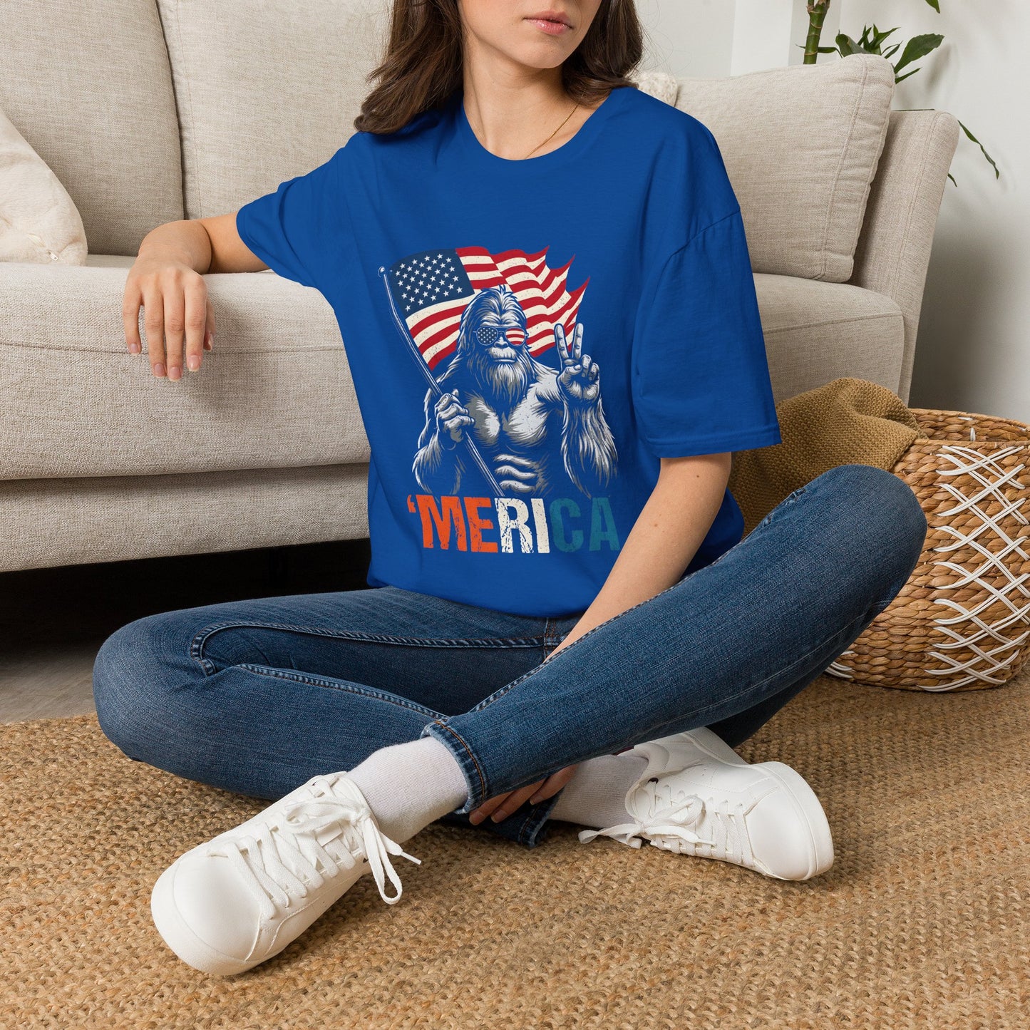 T-Shirt — Patriotic Bigfoot Holding American Flag "MERICA" Graphic
