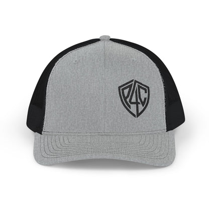 Embroidered Shield Snapback Trucker Hat — Classic Mesh Cap with Monogram Patch