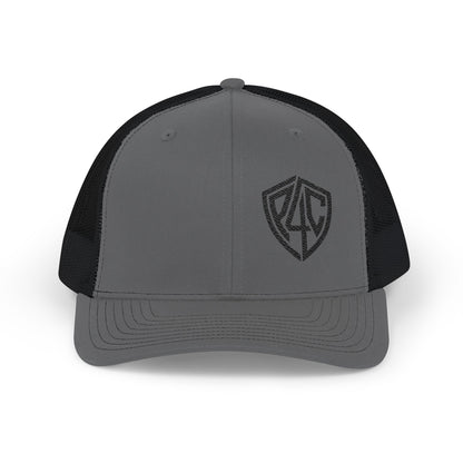 Embroidered Shield Snapback Trucker Hat — Classic Mesh Cap with Monogram Patch