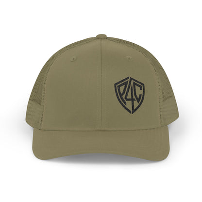 Embroidered Shield Snapback Trucker Hat — Classic Mesh Cap with Monogram Patch